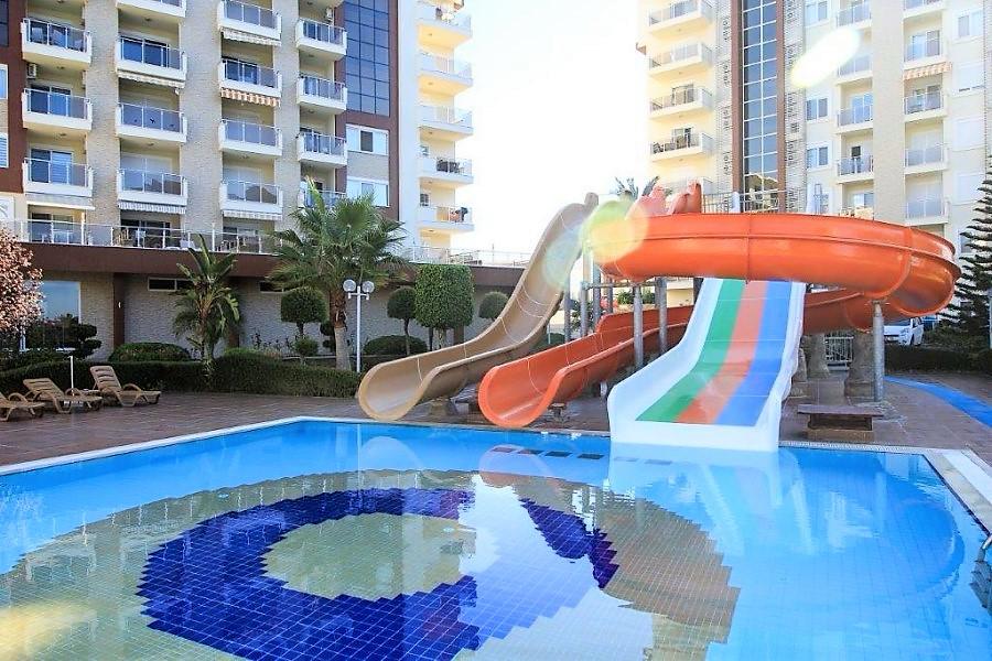 Image of An apartment in a large complex with amenities in Avsallar.